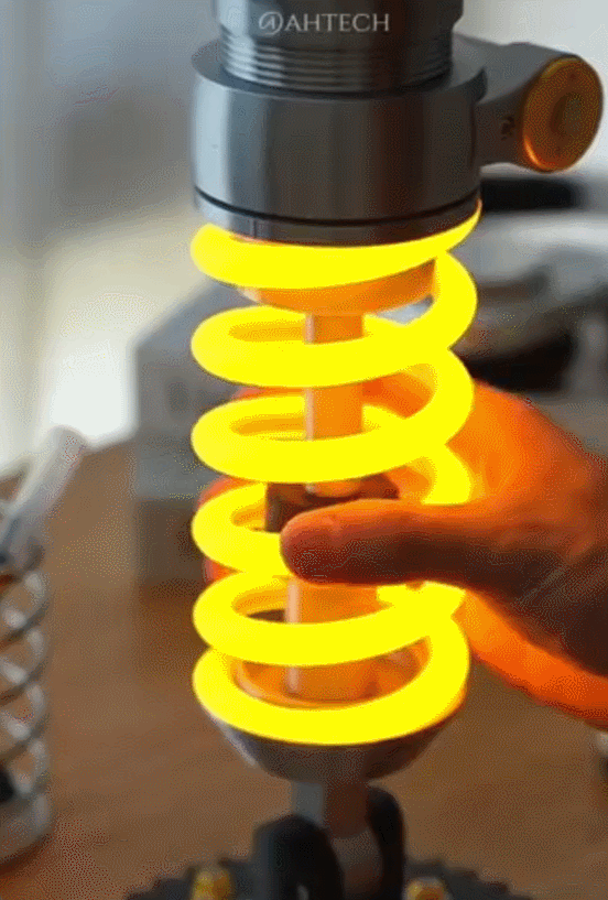 🔥Inspired Suspension Shock Absorber Lamp - Adjustable LED Light for Gamers & Car Enthusiasts