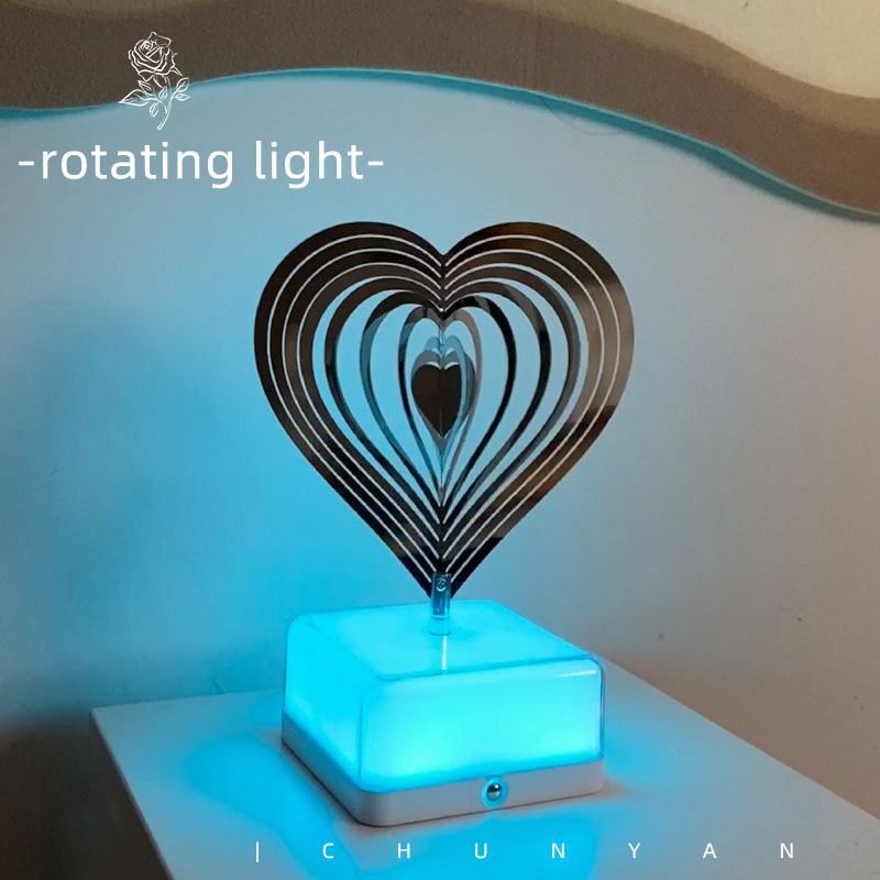 heart-shaped rotating colorful night light