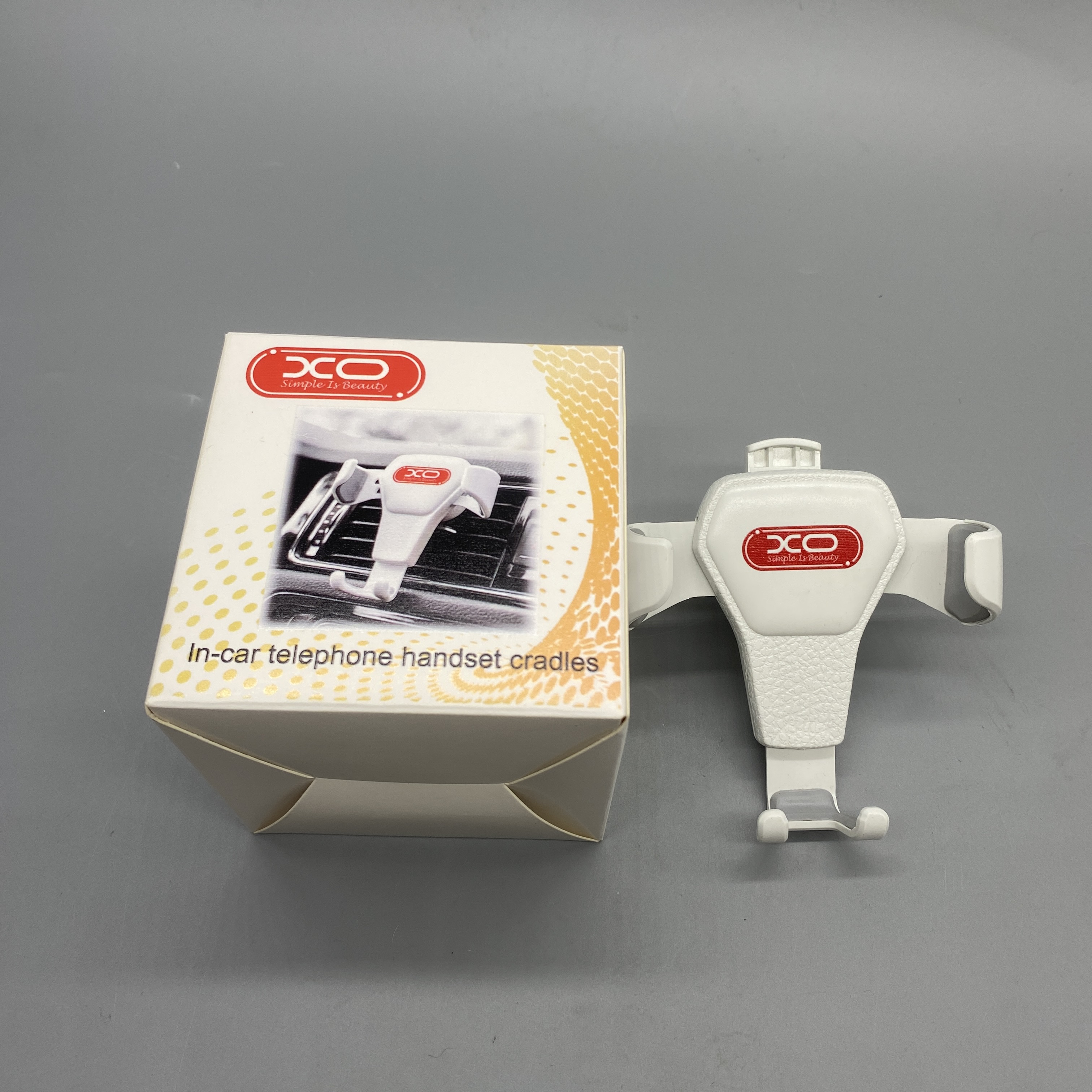 xo simple is beauty In-Car Telephone Handset Cradle - Plastic Material, Fits 4-11 Inch Phones, White Color, 3.6x4x3cm