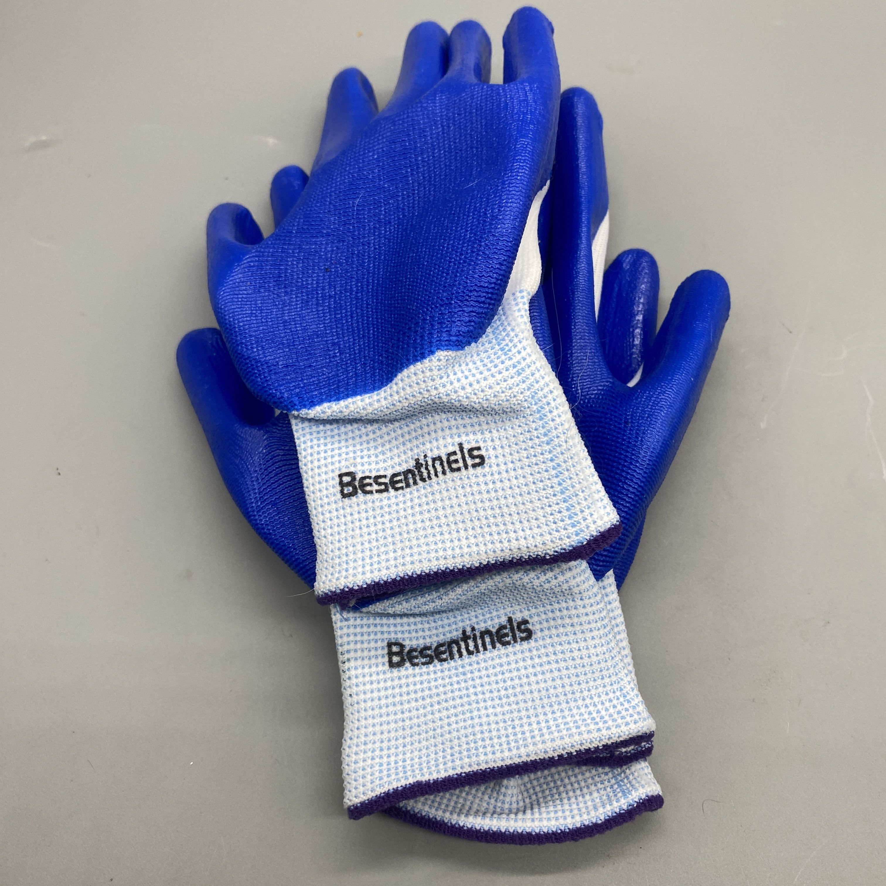 Besentinels Protective Work Gloves - Nitrile Rubber, Nylon Knit Lining, Size 9/L, White & Blue, Industrial Safety for Mechanical, Shipbuilding, Metallurgy, Forestry, Mining, Construction, and Warehouse Handling