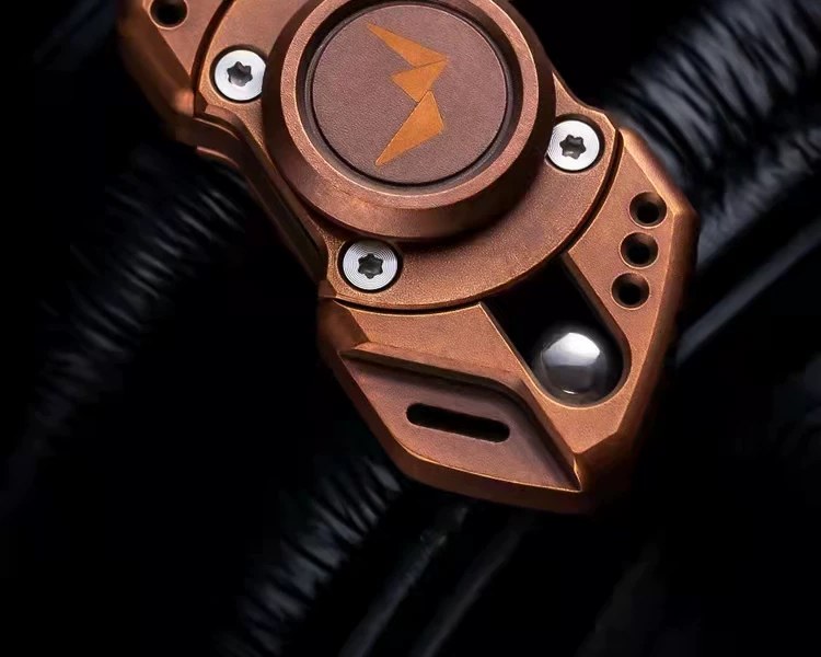 Viper Mini copper finish &mdash; tritium slot detail with lightning logo bearing cap