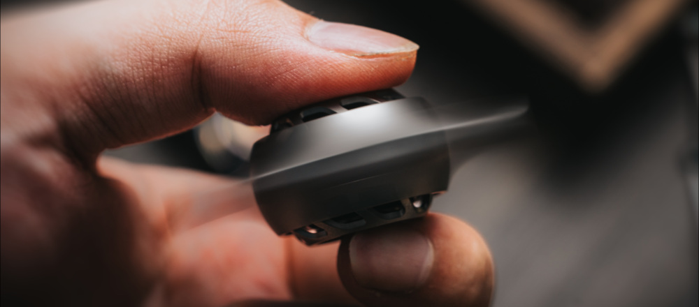 The spinner shown in a hand during use