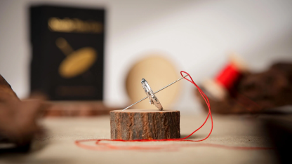 Needle Thru Coin by Artisan Coin & Nathan Kranzo