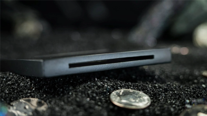  Coin Thru Anything by Nathan Kranzo & TCC Magic