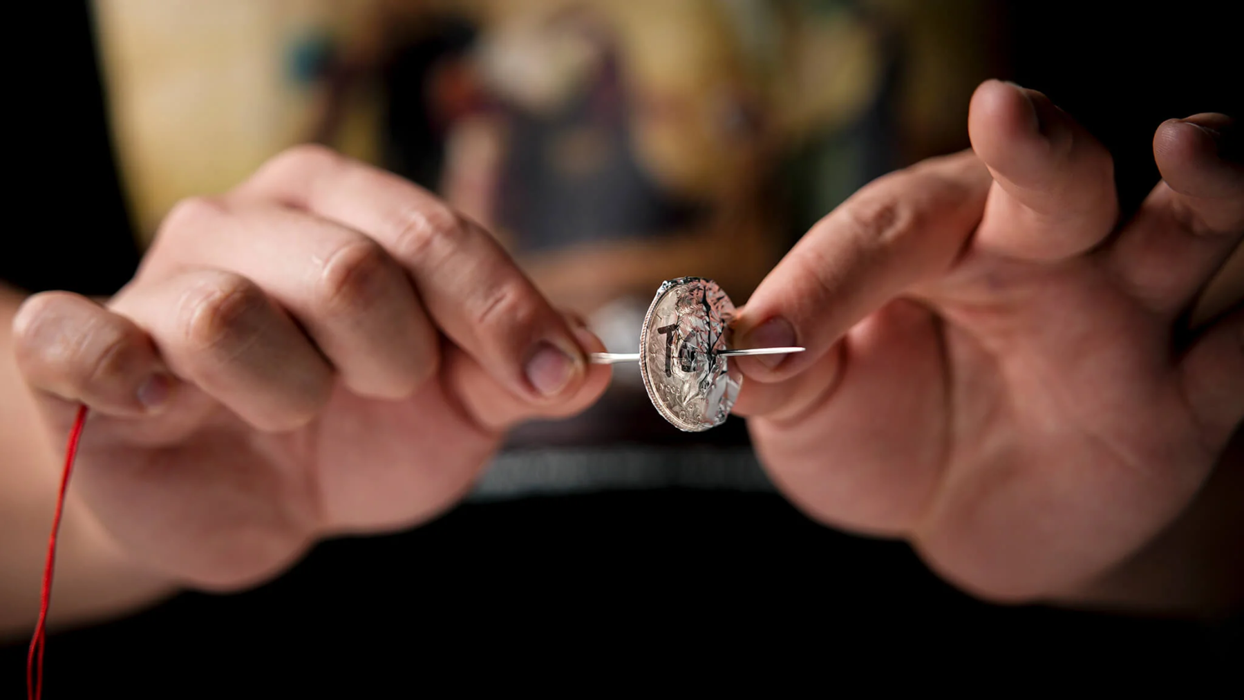 Needle Thru Coin by Artisan Coin & Nathan Kranzo