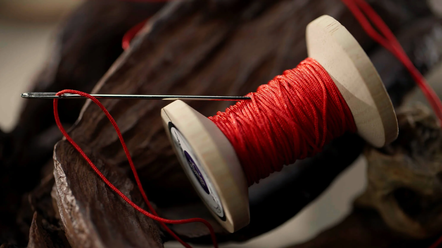 Needle Thru Coin by Artisan Coin & Nathan Kranzo