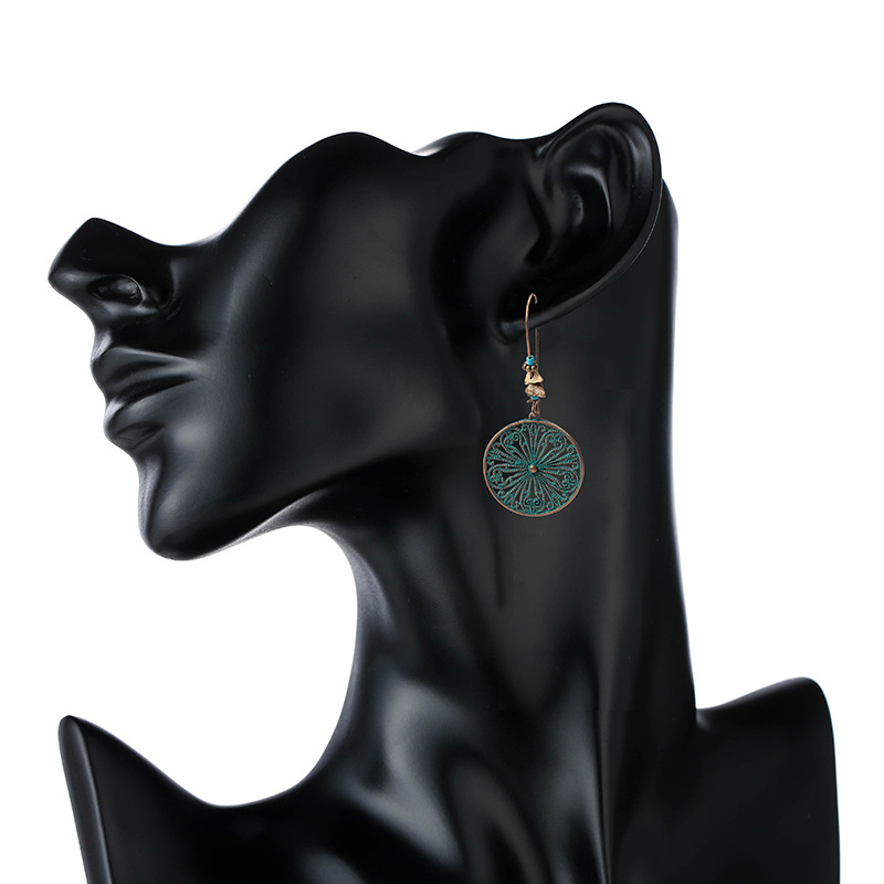 Hollow floral butterfly retro alloy ladies casual earrings