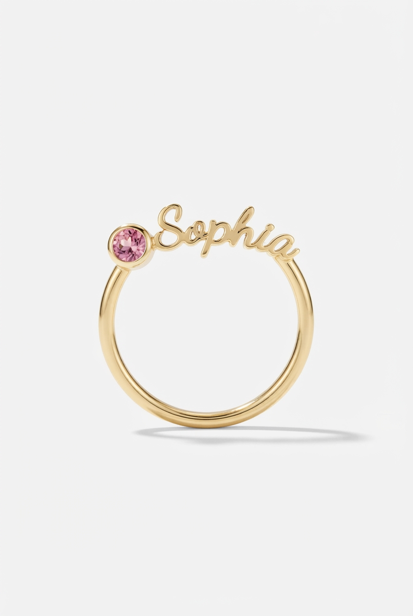 Birthstone name ring on off-white background