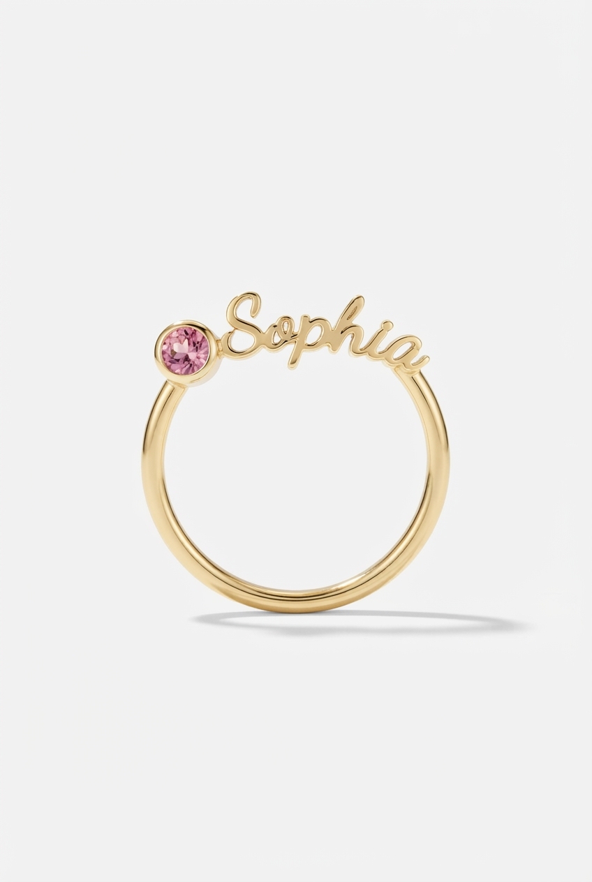 Birthstone name ring on off-white background
