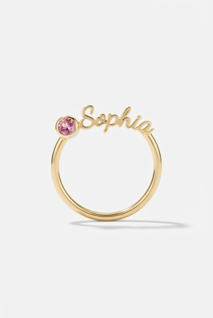 Birthstone name ring on off-white background