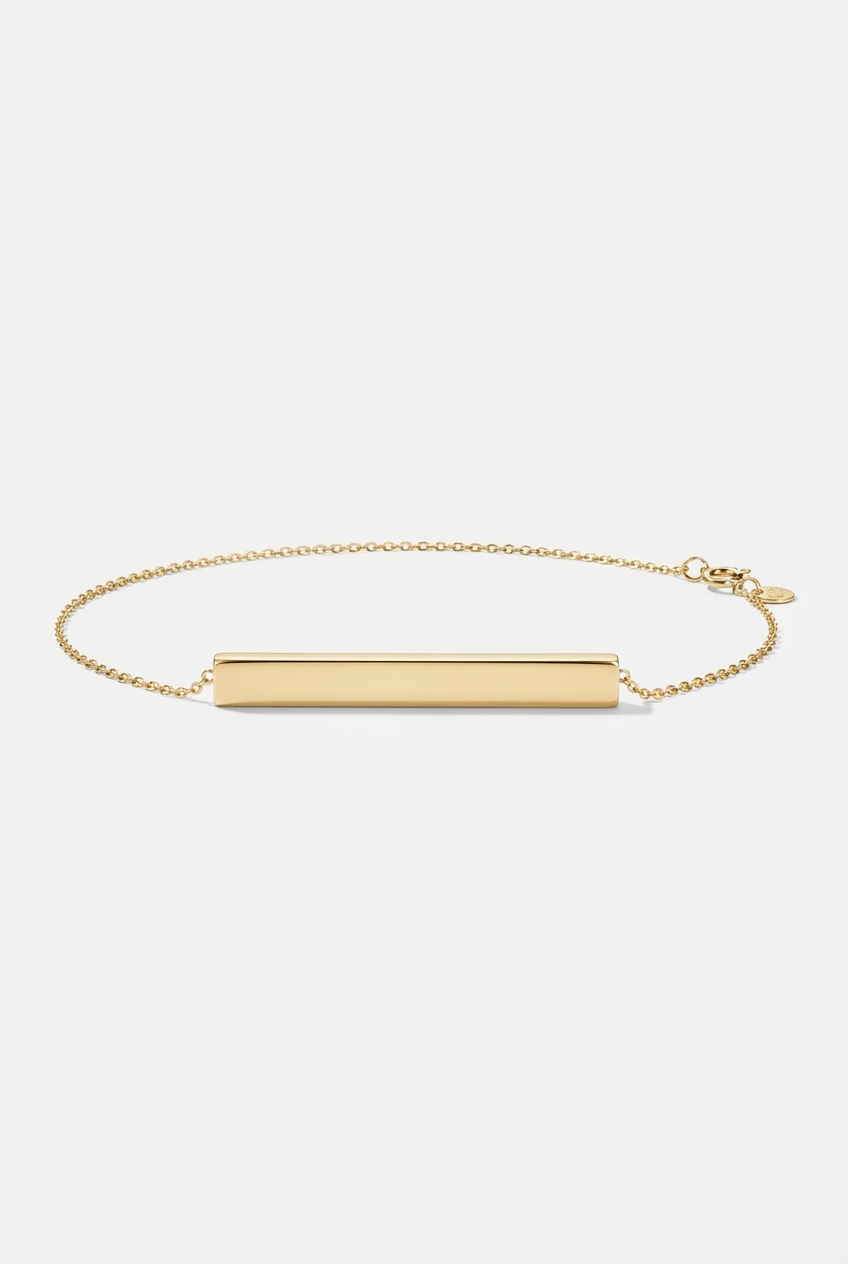 Engraved bar name necklace on off-white background
