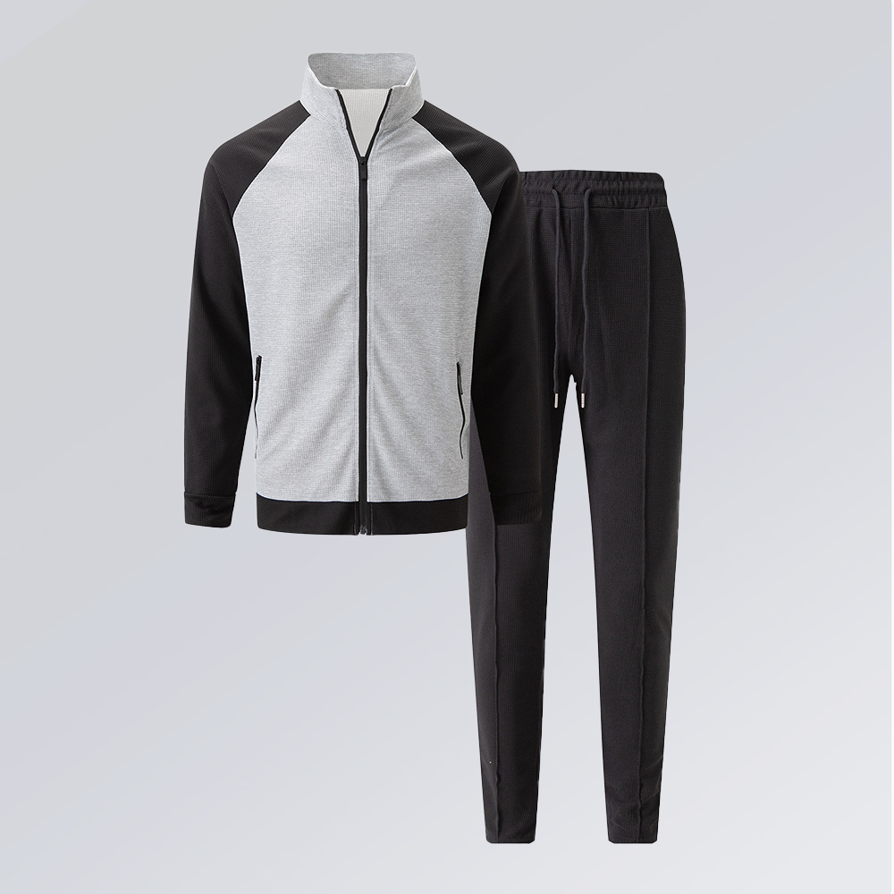 Kontrastierender Herren-Sportanzug mit hohem Kragen und Raglanärmeln, Jacke + Hose