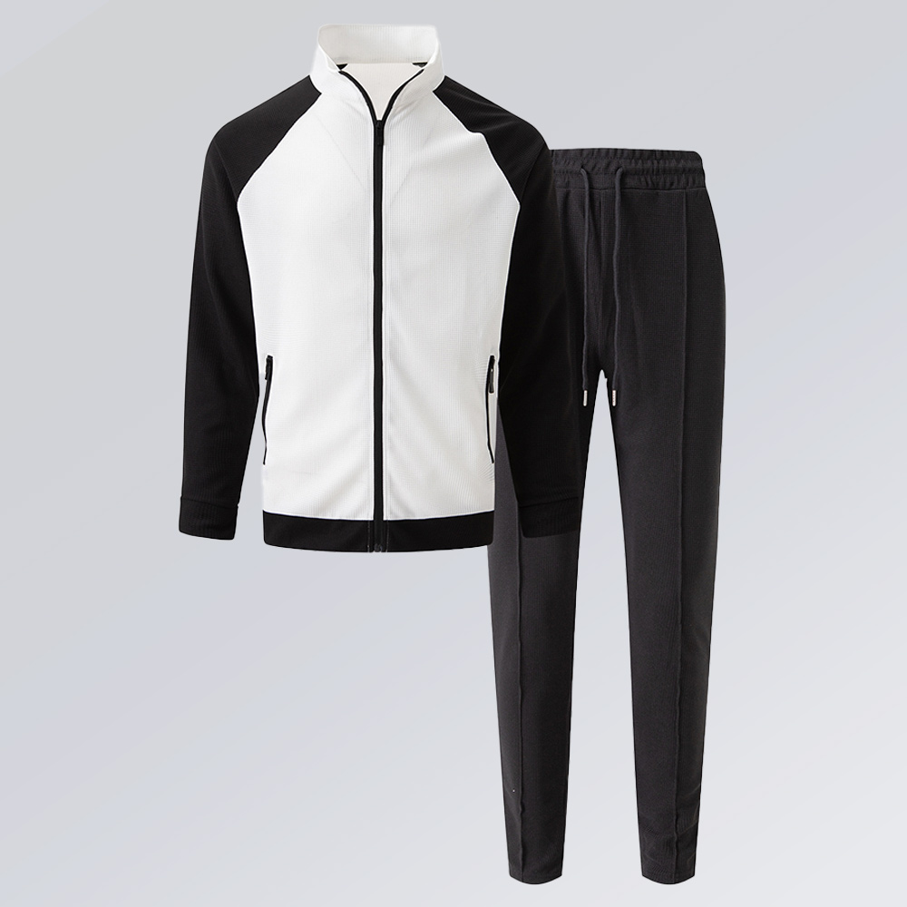 Kontrastierender Herren-Sportanzug mit hohem Kragen und Raglanärmeln, Jacke + Hose