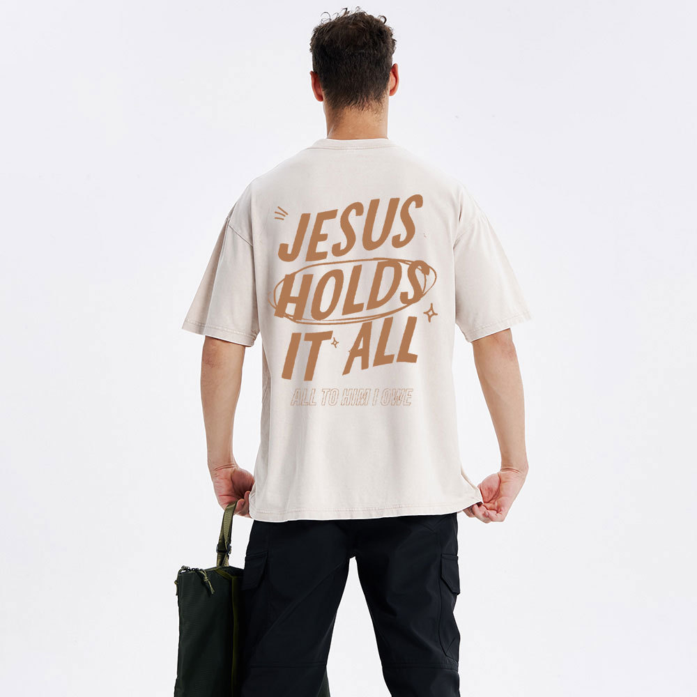 Jesus Holds It All Christian Washed T-Shirt