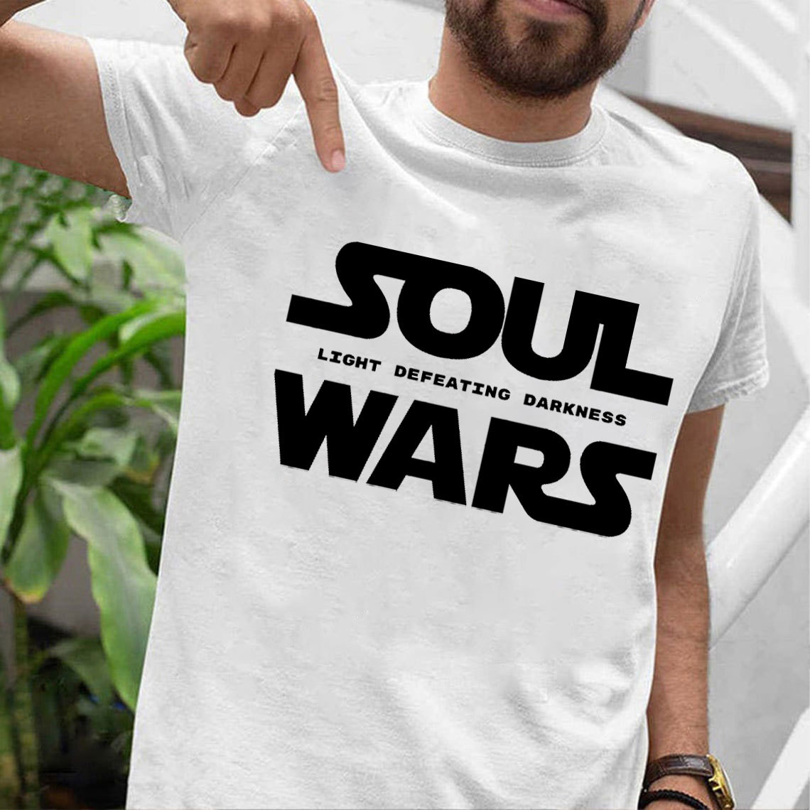 Light Defeating Darkness Christian T-Shirt