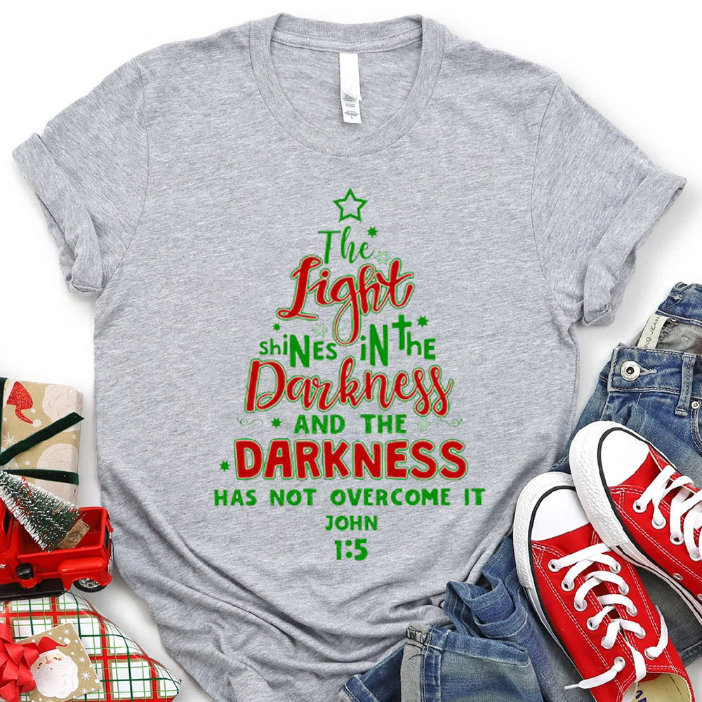 The Light Shining In The Darkness Christian Christmas T-Shirt