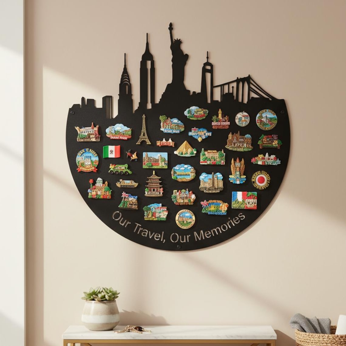 May include: A black, circular wall decoration featuring a silhouette of city skylines and landmarks, including the Statue of Liberty and the Eiffel Tower. The decoration holds numerous colorful souvenir magnets. The text "Our Travel, Our Memories" is printed on the bottom.