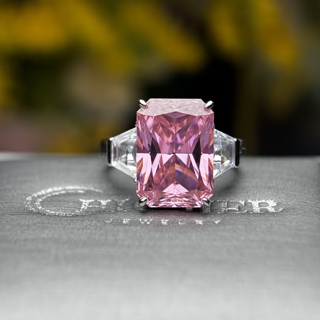 8.4ct Emerald Cut Pink Sapphire Three Stone Engagement Ring