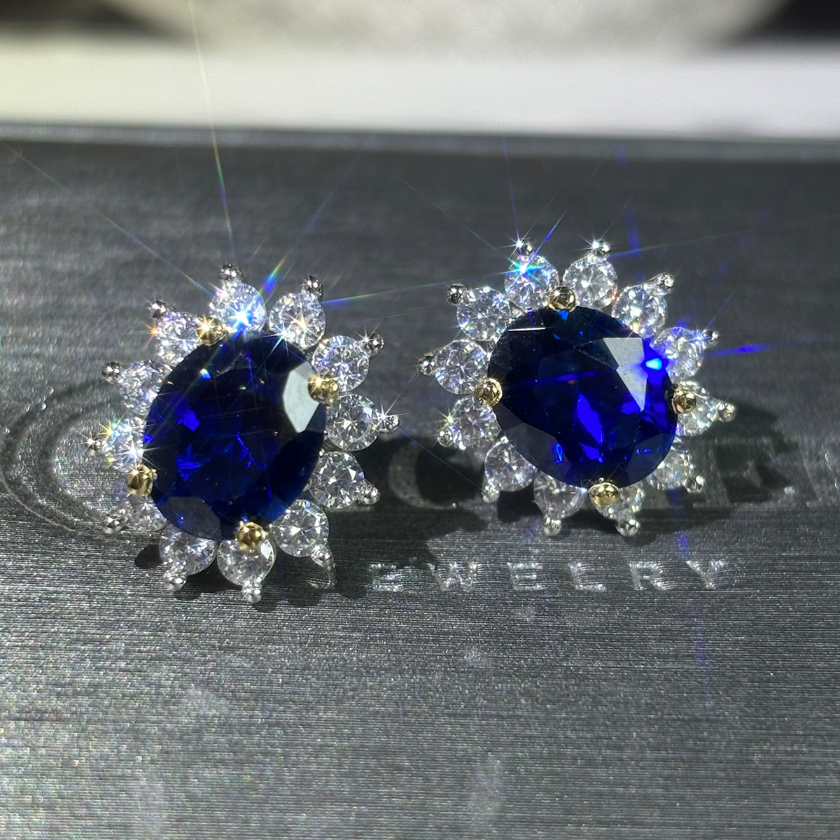 Halo Oval Cut Blue Sapphire Stud Earrings