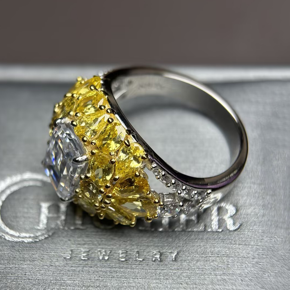 4ct Emerald Cut White Sapphire & Round Cut Yellow Sapphire Ring