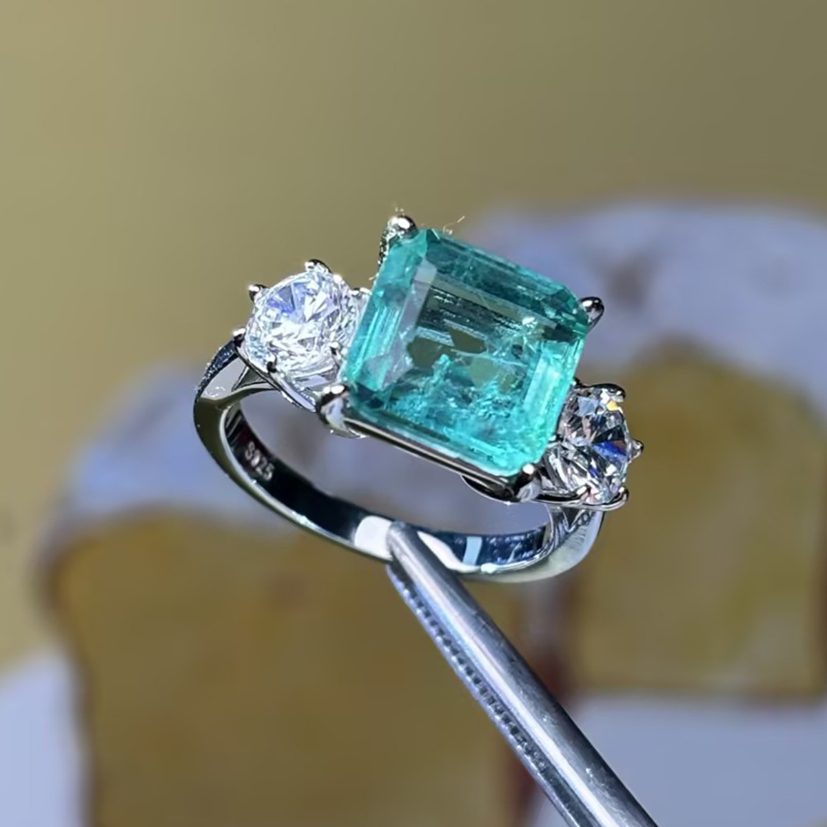 Classic 3ct Emerald Cut Emerald & White Sapphire Three Stone Engagement Ring