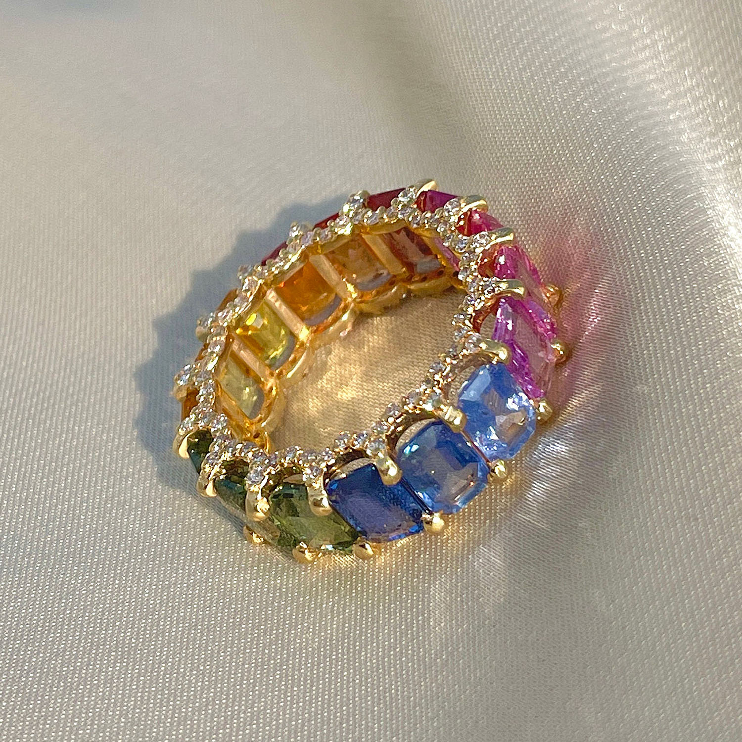 6.75ct Emerald Cut Rainbow Sapphire Eternity Ring