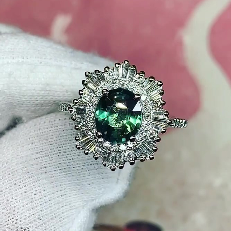1.5ct Oval Cut Emerald Sapphire Stellar Halo Engagement Ring