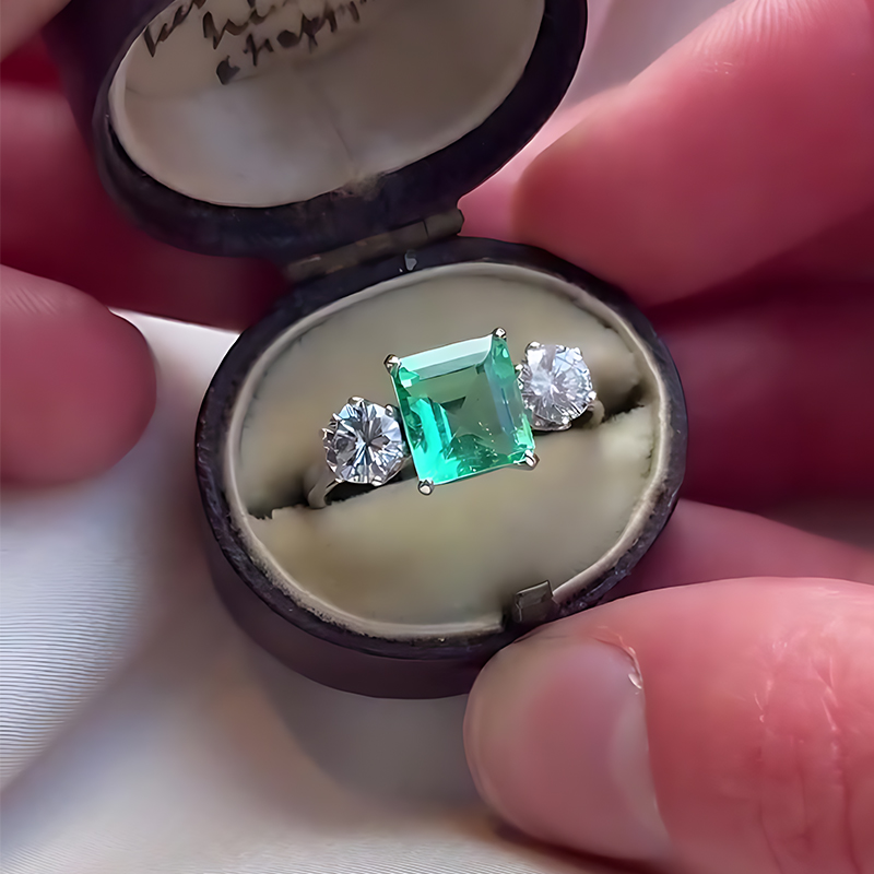 Classic 3ct Emerald Cut Emerald & White Sapphire Three Stone Engagement Ring