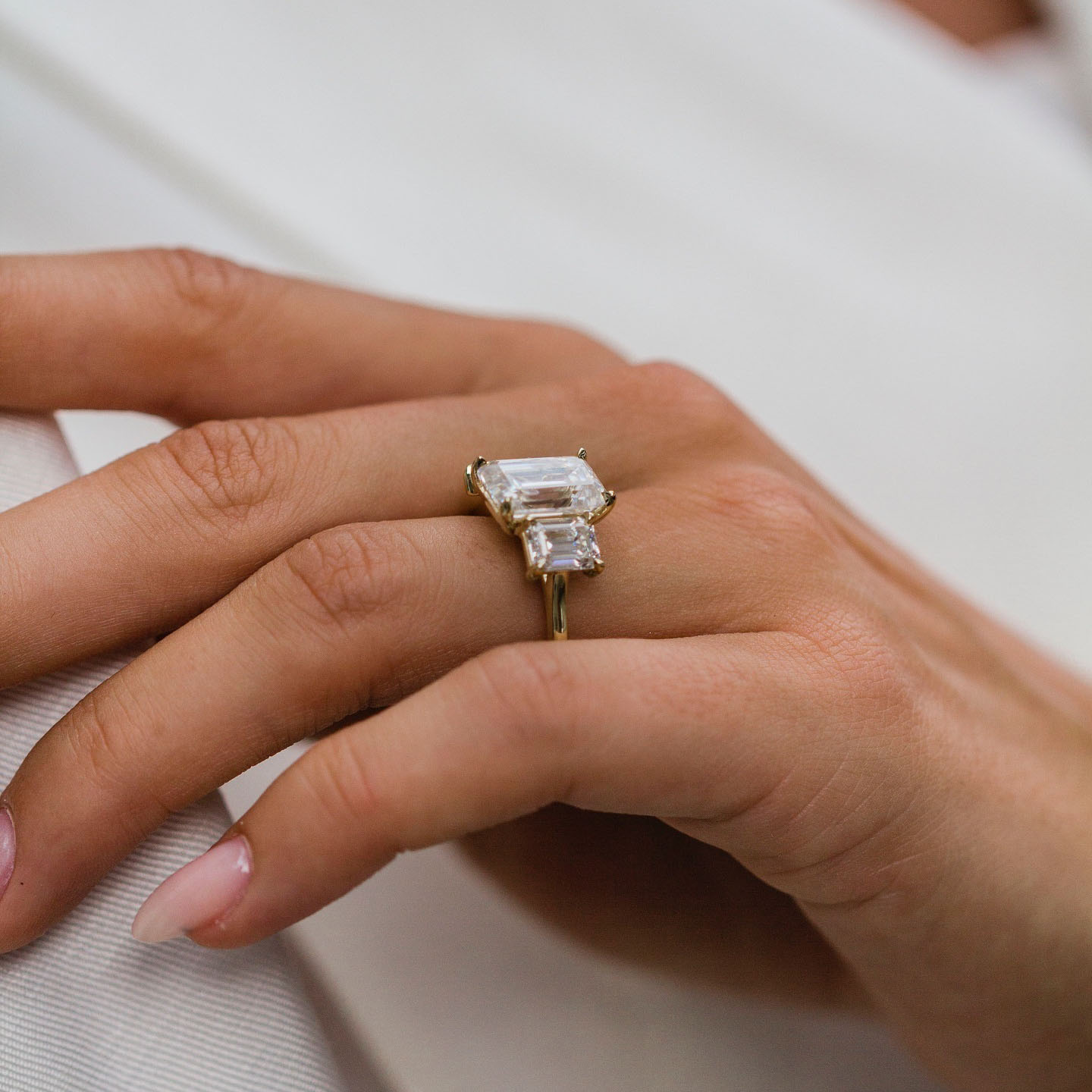 4.5ct Step Emerald Cut Three-Stone Engagement Ring