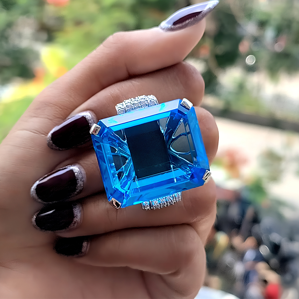 15ct Emerald Cut Blue Sapphire Side Diamond Engagement Ring