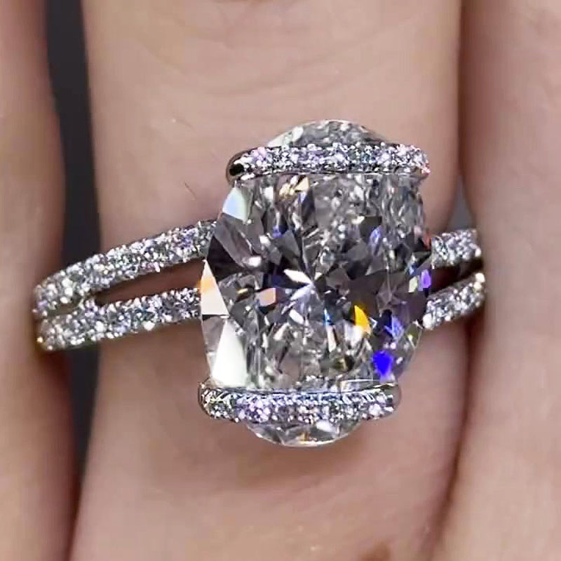 Unique 6ct Oval Cut White Sapphire Halo Engagement Ring