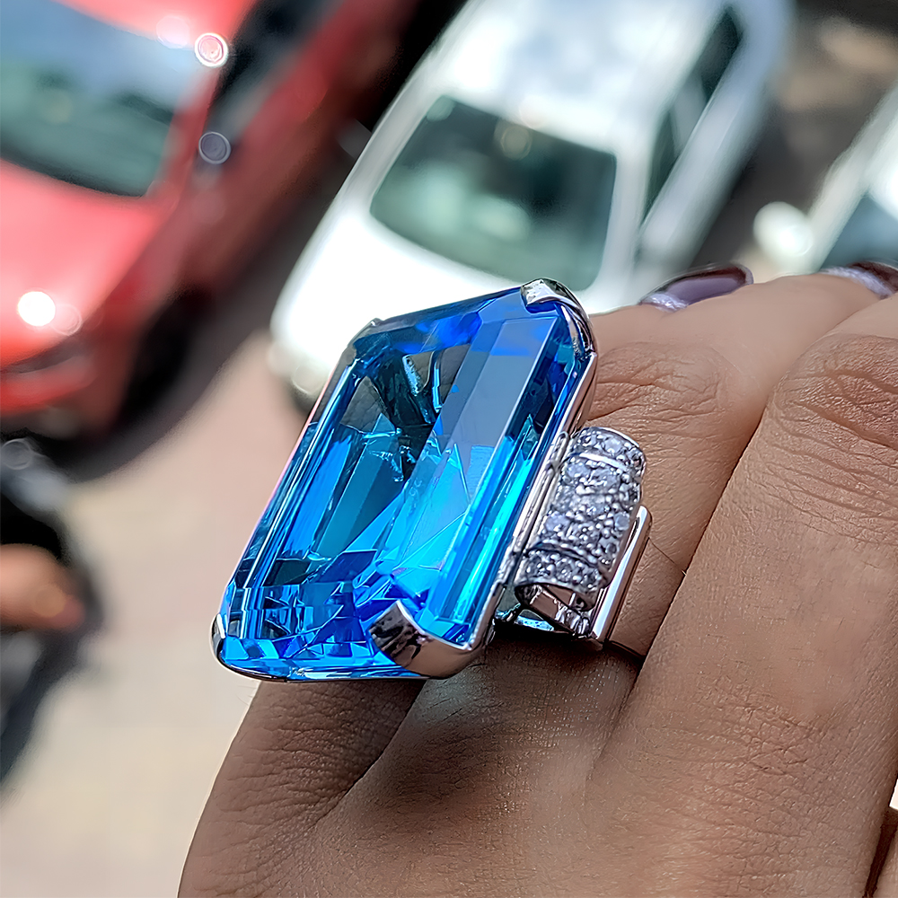 15ct Emerald Cut Blue Sapphire Side Diamond Engagement Ring