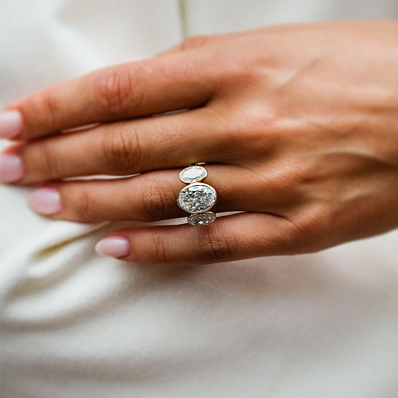 8ct Bezel Setting Three-Stone Oval Cut White Sapphire Ring