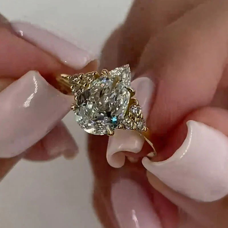 4ct Pear Cut White Sapphire Engagement Ring