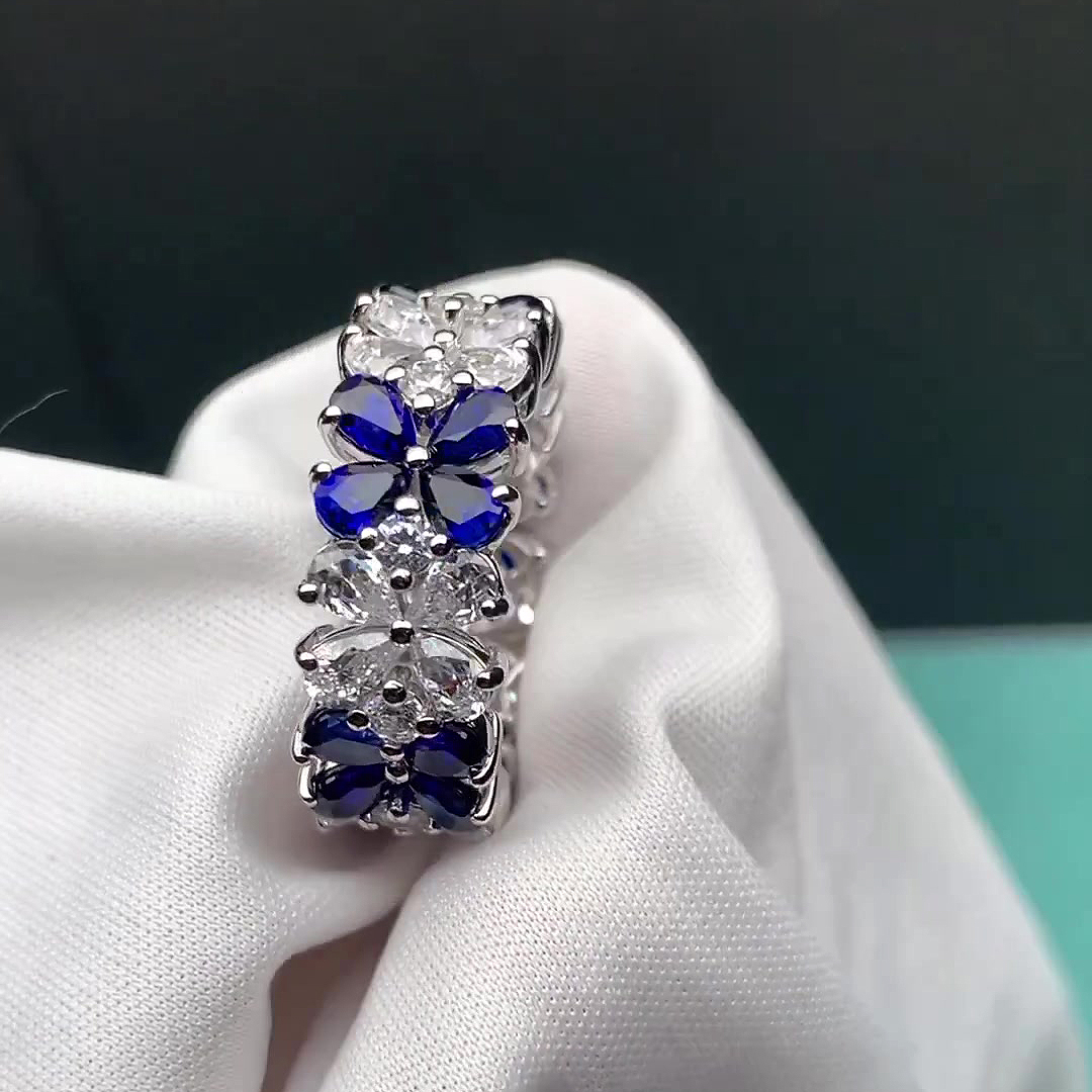 6.55ct Flower Design Pear Cut Blue Sapphire Eternity Ring
