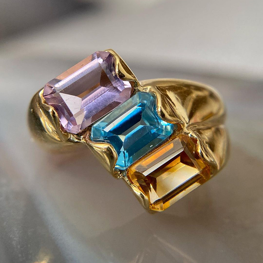 6ct Emerald Cut Rainbow Sapphire Eternity Ring