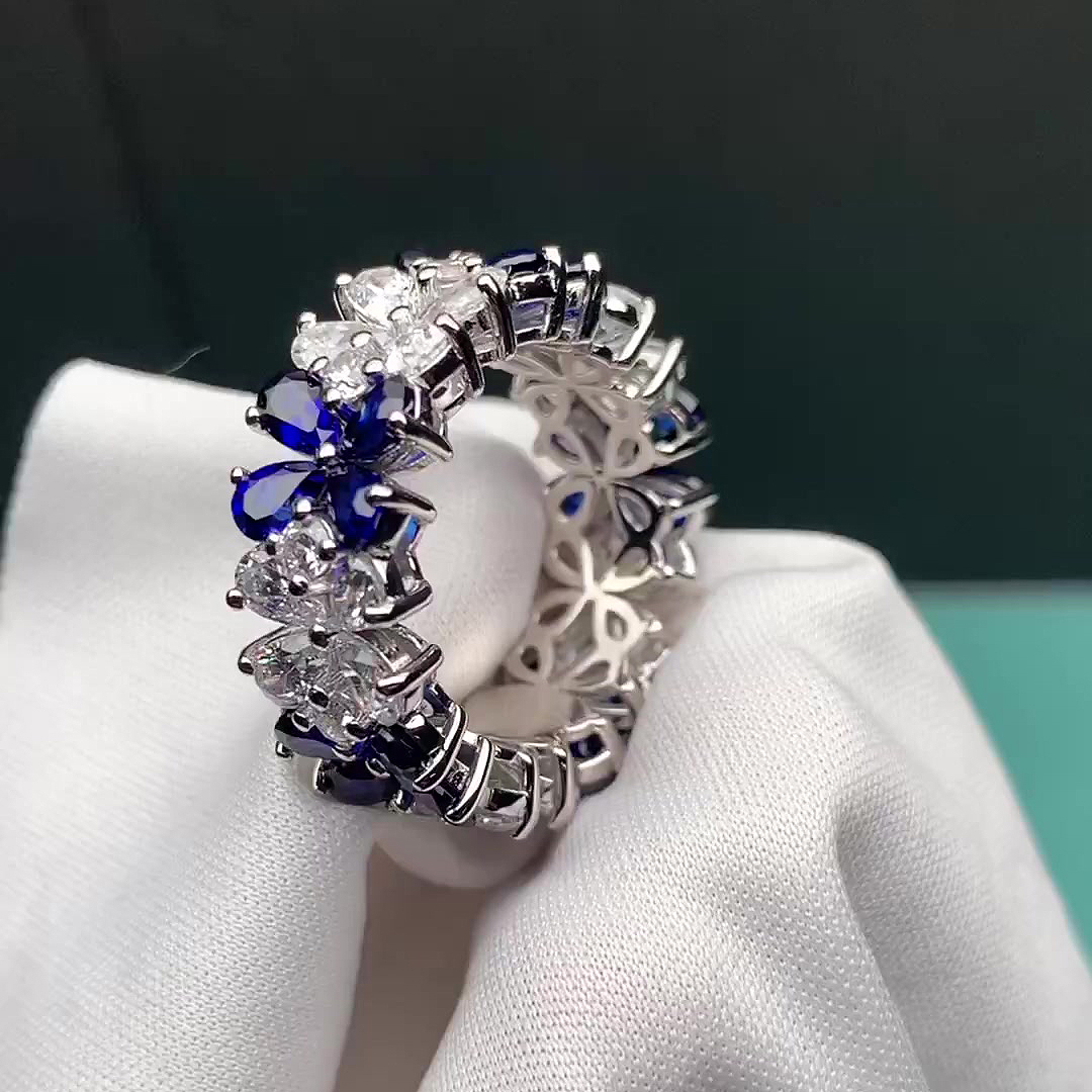 6.55ct Flower Design Pear Cut Blue Sapphire Eternity Ring