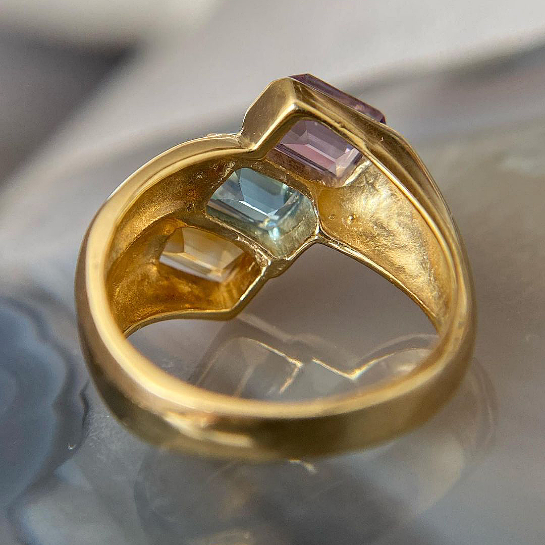 6ct Emerald Cut Rainbow Sapphire Eternity Ring