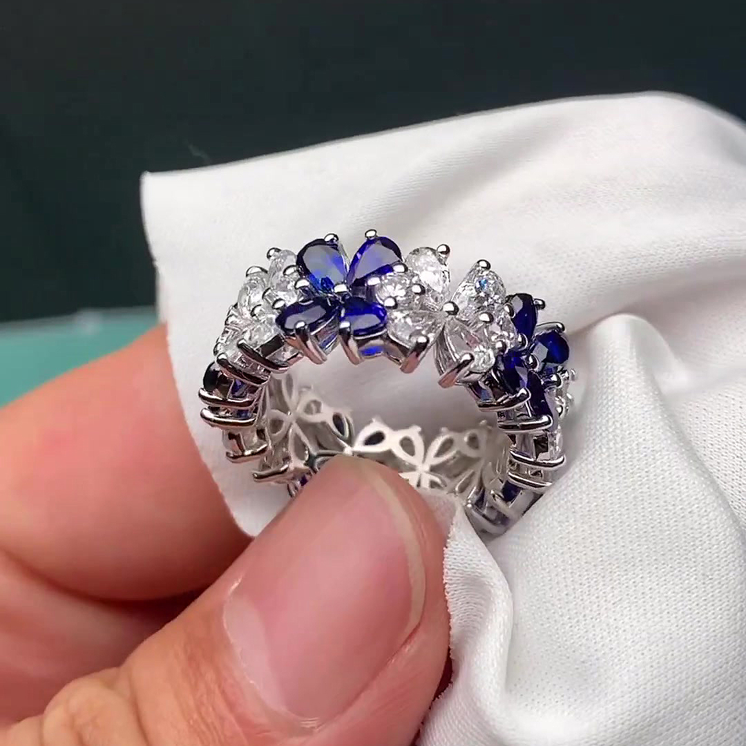 6.55ct Flower Design Pear Cut Blue Sapphire Eternity Ring
