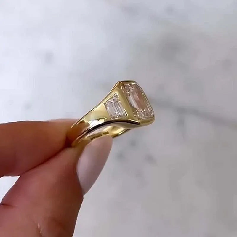 4.5ct Three Stone Emerald Cut All Over Bezel Set Yellow Gold Engagement Ring