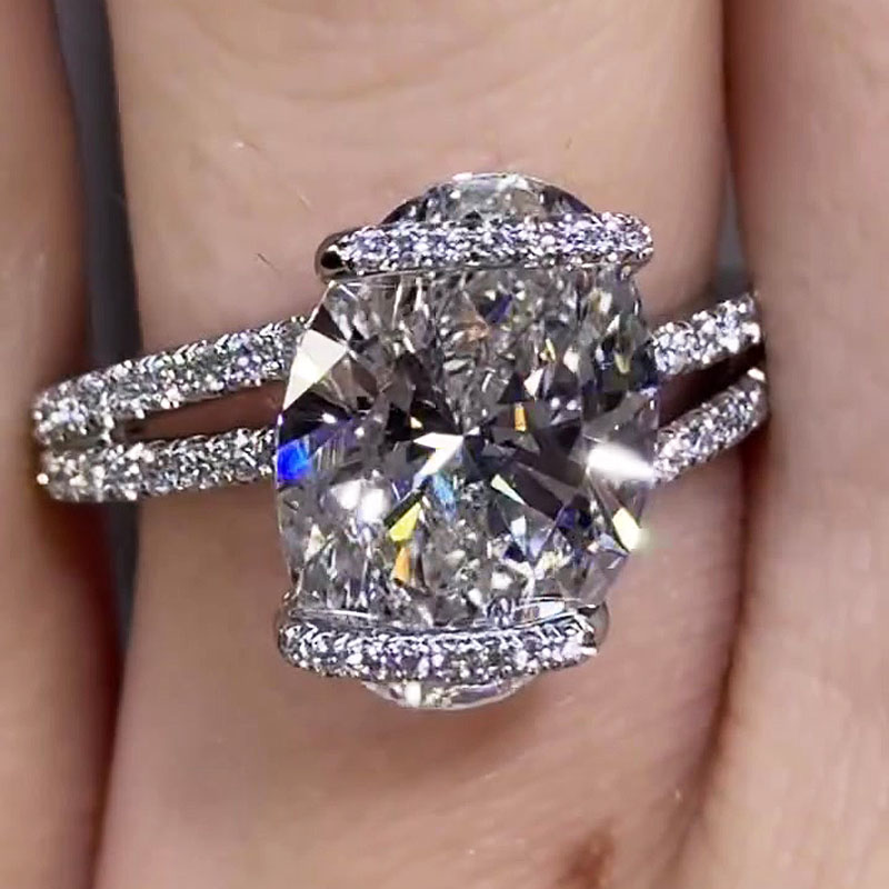 Unique 6ct Oval Cut White Sapphire Halo Engagement Ring