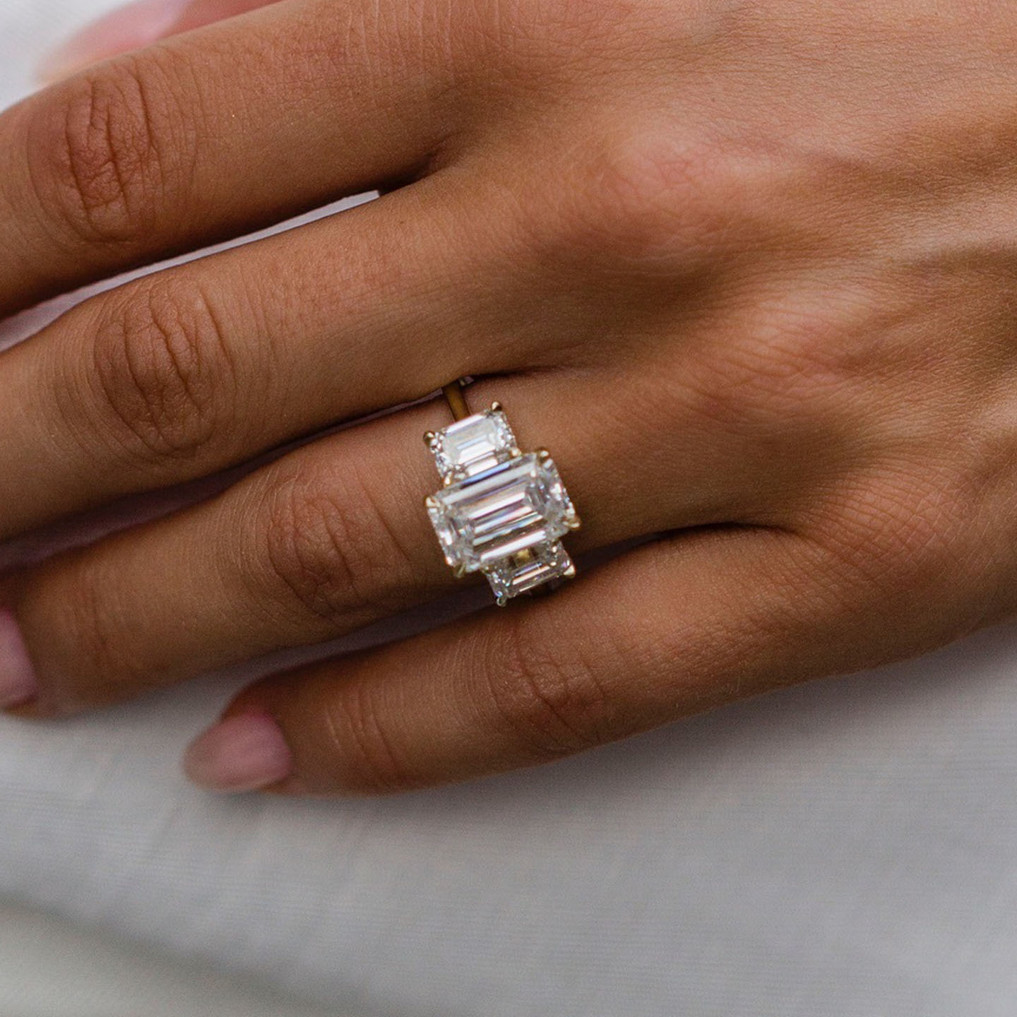 4.5ct Step Emerald Cut Three-Stone Engagement Ring