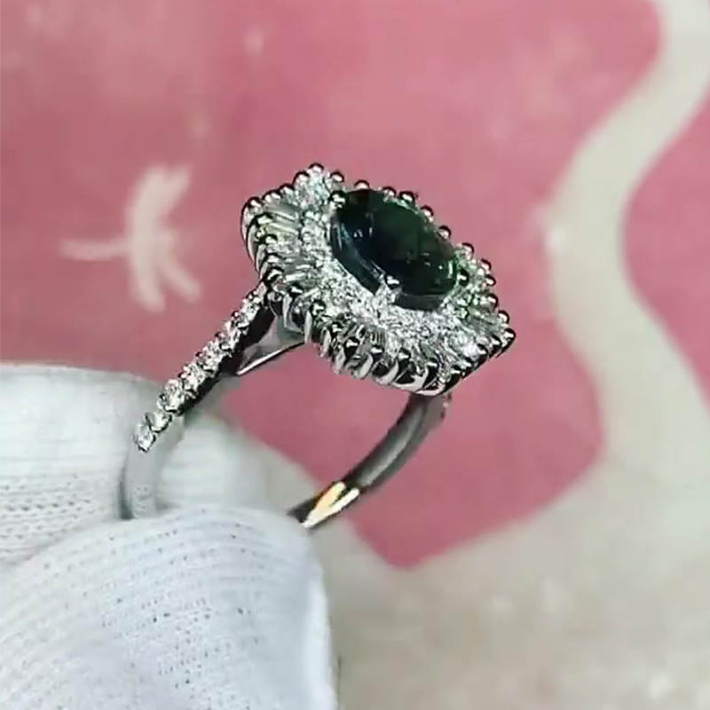 1.5ct Oval Cut Emerald Sapphire Stellar Halo Engagement Ring