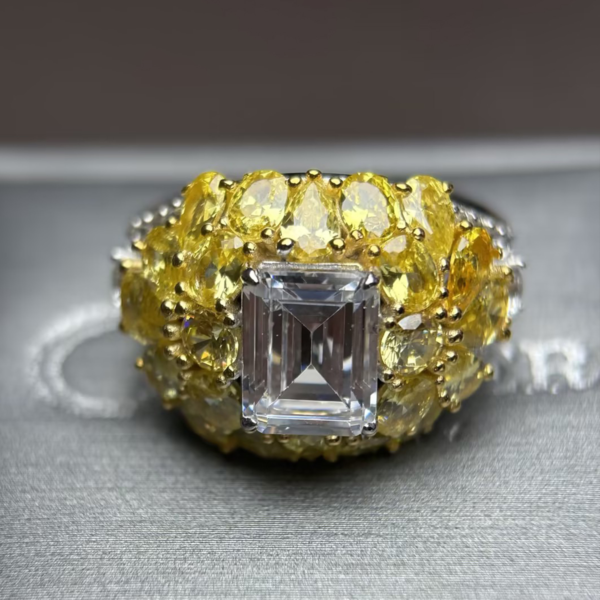 4ct Emerald Cut White Sapphire & Round Cut Yellow Sapphire Ring