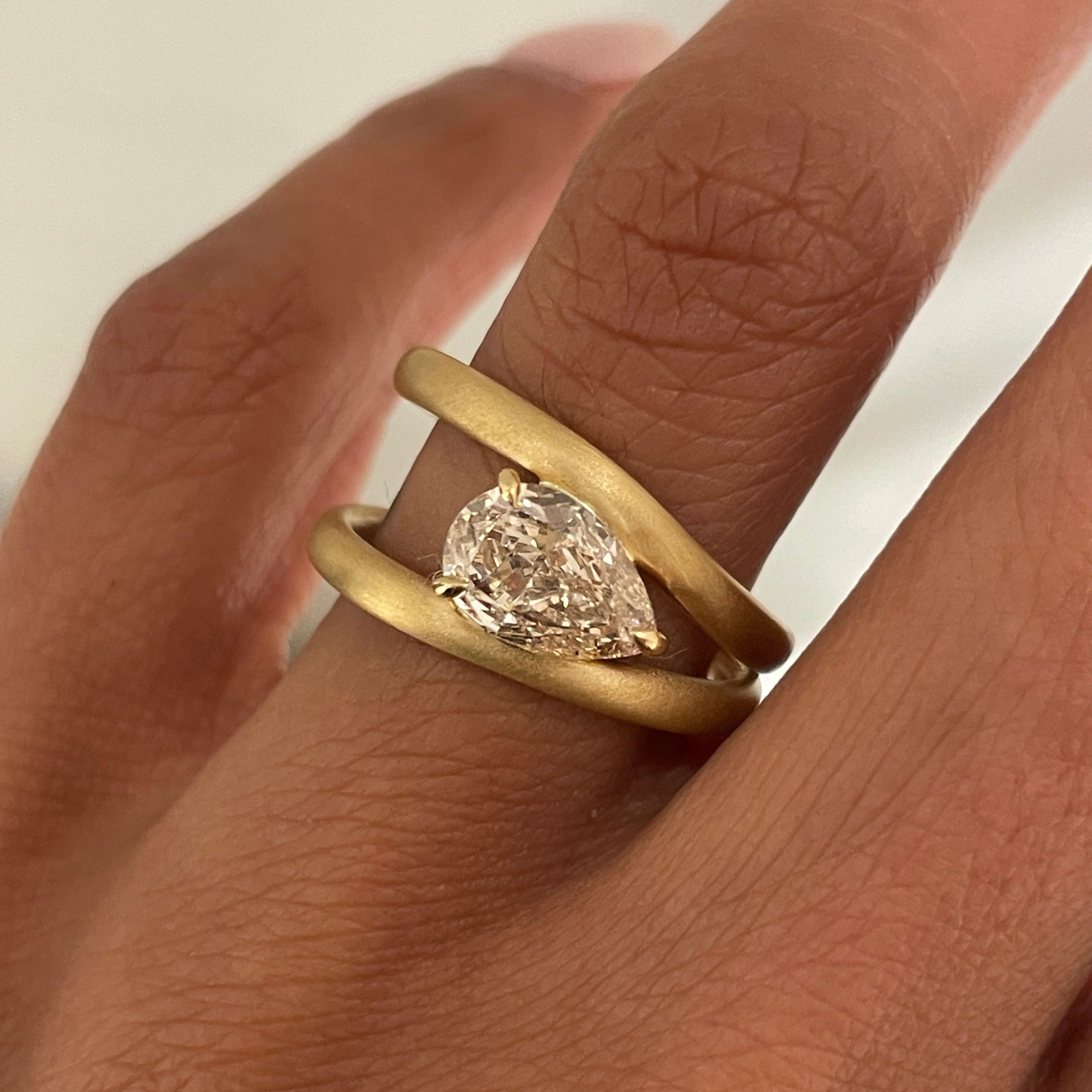 1.5ct Three-prong Setting Pear Cut White Sapphire Engagement Ring