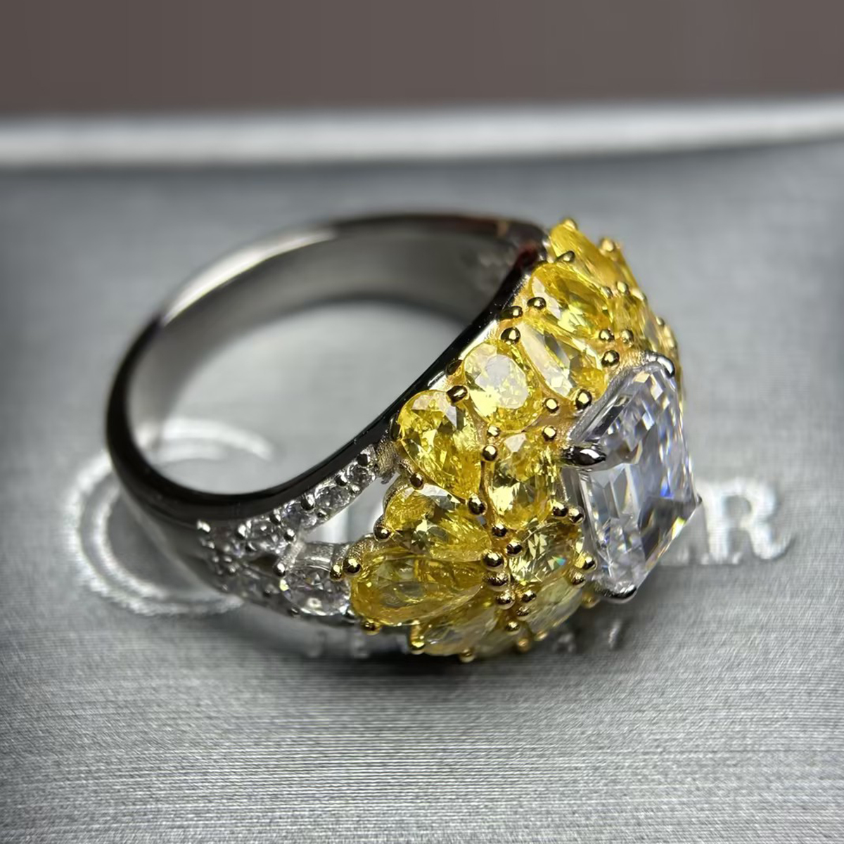 4ct Emerald Cut White Sapphire & Round Cut Yellow Sapphire Ring