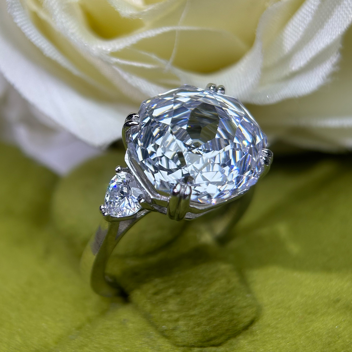 5ct Octagonal Cut White Sapphire Three-Stone Engagement Ring