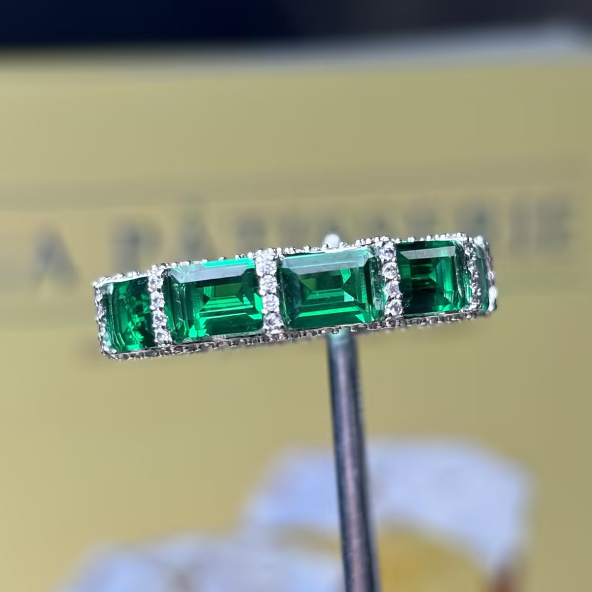 10ctw Emerald Cut Emerald & White Sapphire Pavé Eternity Band