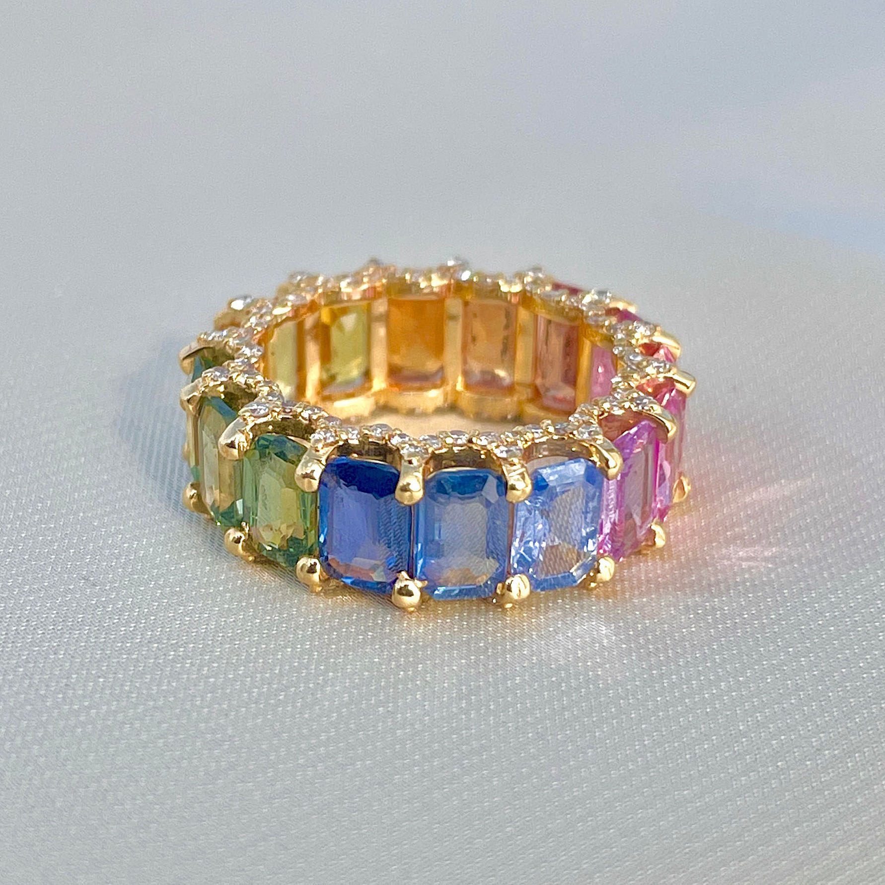 6.75ct Emerald Cut Rainbow Sapphire Eternity Ring