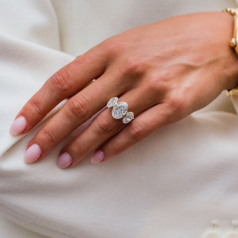 8ct Bezel Setting Three-Stone Oval Cut White Sapphire Ring